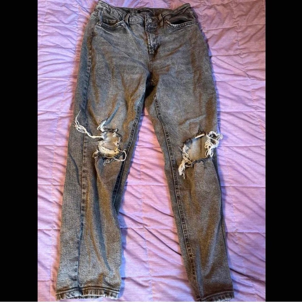 ripped grey jeans